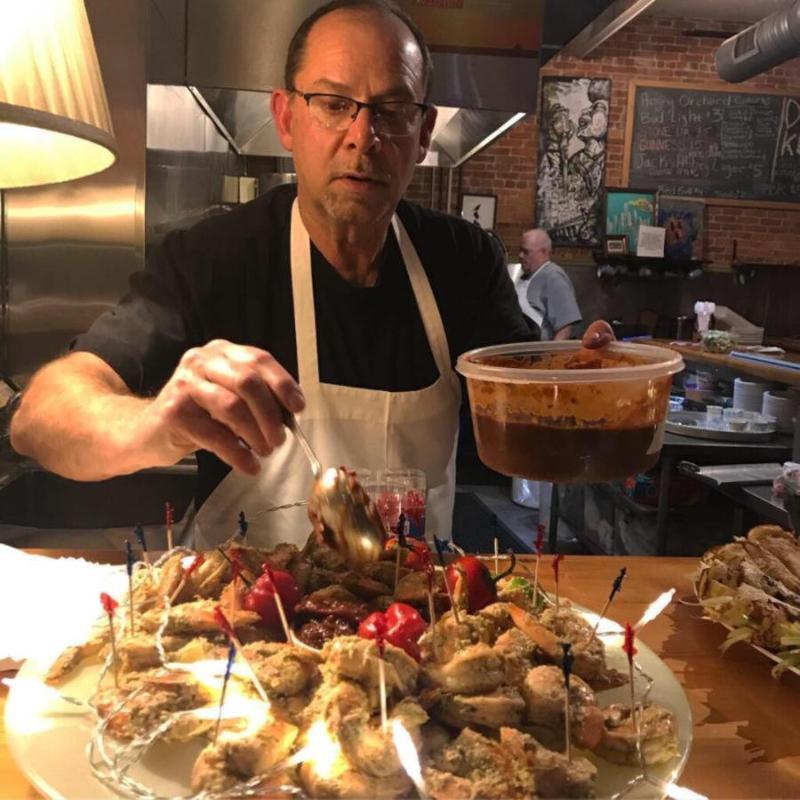 Chef Peter Hadley adding finishing touches